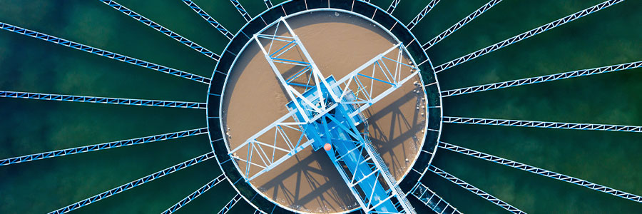 Top-down view of a pool of water in a water treatment plant.