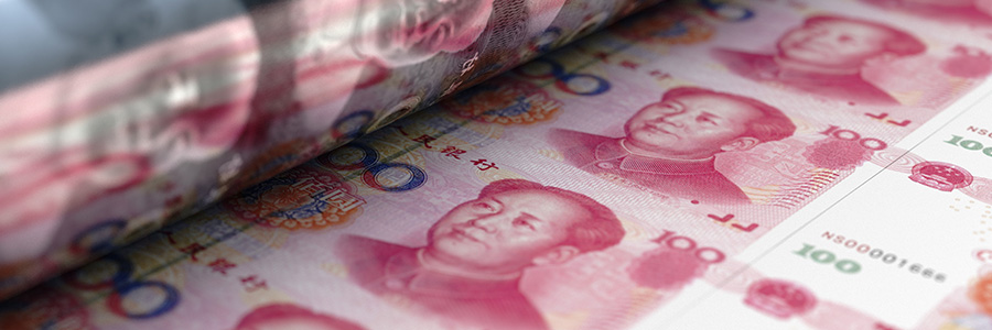 A close up of Chinese Yuan bills being printed.